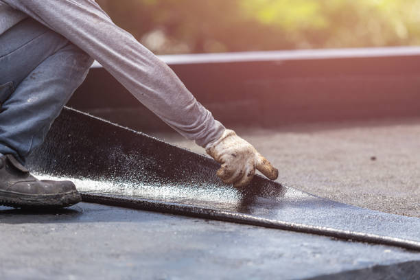 Professional Waterproofing technician working in Maplewood, MN